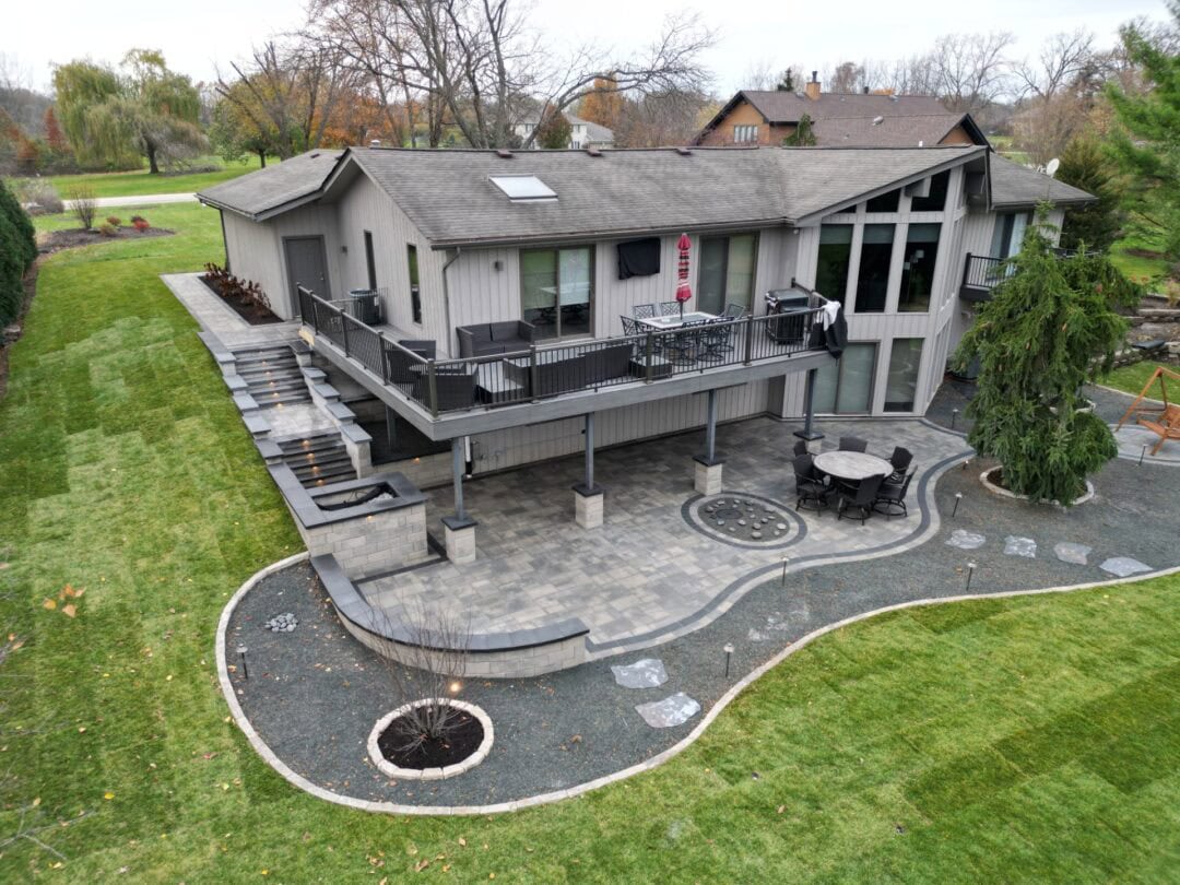 Modern house with elevated deck and patio