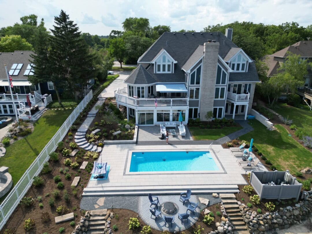 Lakeside house with pool and garden