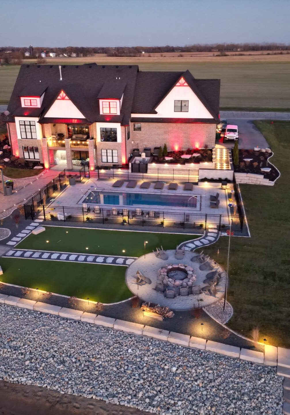 Luxurious house with pool and firepit.