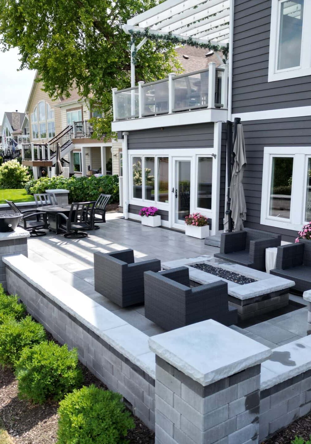 Modern patio with outdoor seating and fire pit